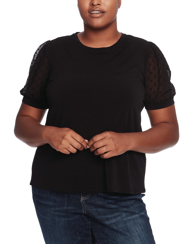Front of a model wearing a size 1X Candice Puff-Sleeve Top in 060-RICH BLACK by CeCe. | dia_product_style_image_id:263726